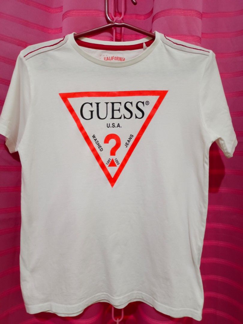 Guess for girls (Category: Shirts) located in Angeles City. Submitted by 3JSale (Listing ID 1248625902, Image 1). Description: Guess cotton stretch Size tag at 14y but fits S-M ladies Excellent Condition.