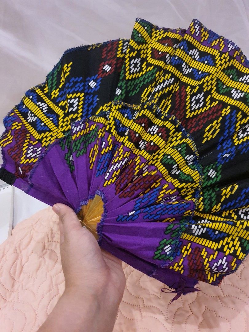 Hand fan (turns into a Hat) Made in Davao (Category: Caps & Hats) located in Manila. Submitted by jell.in.carousel (Listing ID 1284113633, Image 2). Description: This colorful fan doubles as a hat! It turns into a cute little hat to protect you from the sun. ☀️ - Unused, never worn - Comes with a Keychain! Souvenir from Davao MOP: GCash, Bank transfer MOD: Lalamove, J&T Express.