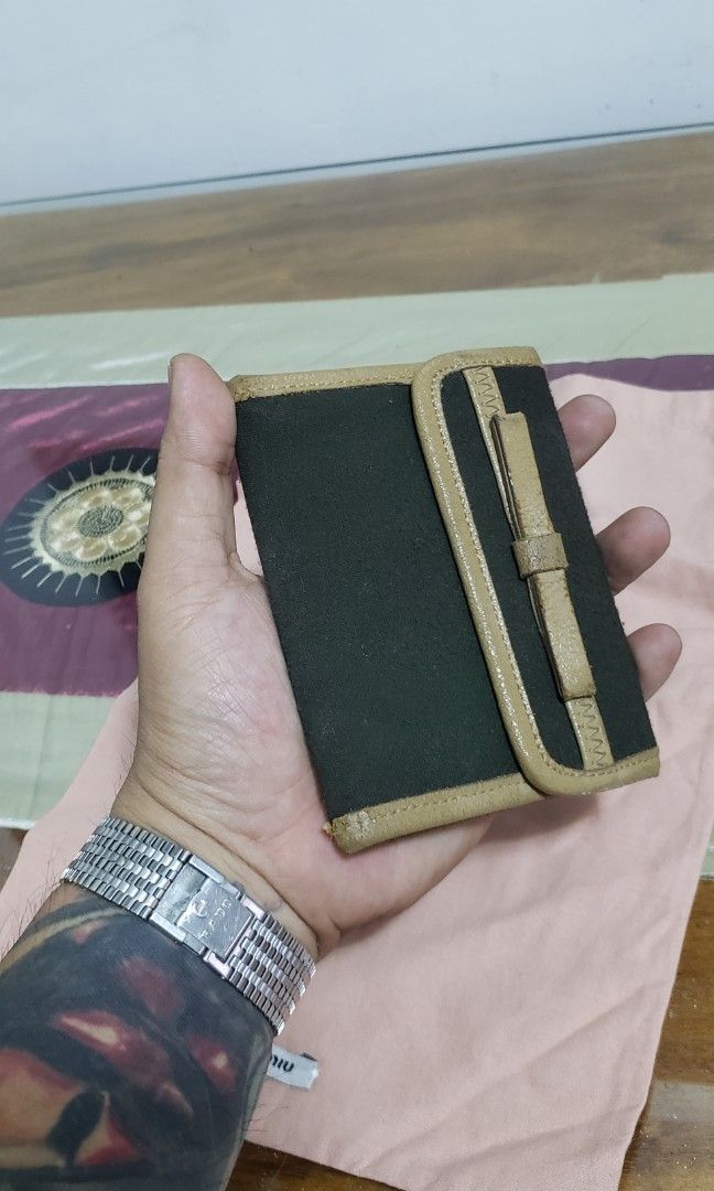 Miu miu (Category: Luxury Bags & Wallets) located in Manila. Submitted by mistej (Listing ID 1284214814, Image 3). Description: miu miu tripold wallet multiple card slot wool and leather material authentic guaranteed japan thrifted.