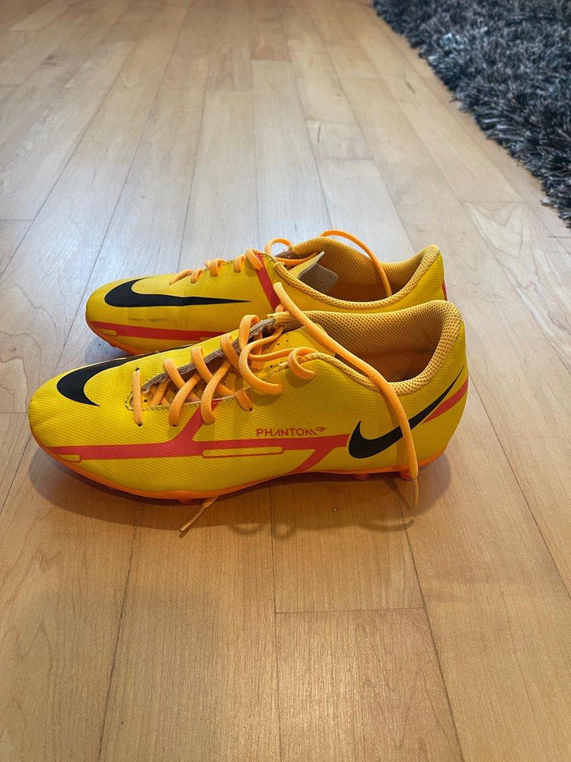 Yellow youth discount football cleats