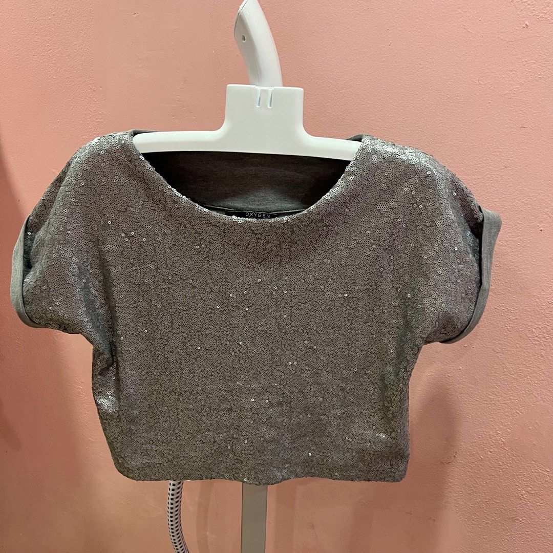 Oxygen Gray sequins party top (Category: Shirts) located in Manila. Submitted by zannedeclutters (Listing ID 1283966490, Image 1). Description: ‼️‼️‼️PLEASE READ FIRST👇🏼 Measurements are already included in the photos. Semi crop top RFS: not using anymore. Na-stuck nalang sa cabinet. Please manage your expectations Shipping: Mon-Fri: pickup point from Avida Towers San Lazaro / SM San Lazaro Shipping via Grab or Lalamove ONLY. No JRS, J&T, LBC, 