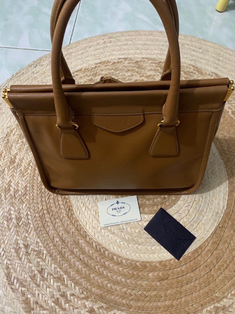 Prada Coach LV Dior Gucci (Category: Luxury Bags & Wallets) located in Makati City. Submitted by MikeRM (Listing ID 1283986443, Image 1). Description: like new,used occasionally less than 5x.no issues/repairs/damages.With authenticity card dated 2013..