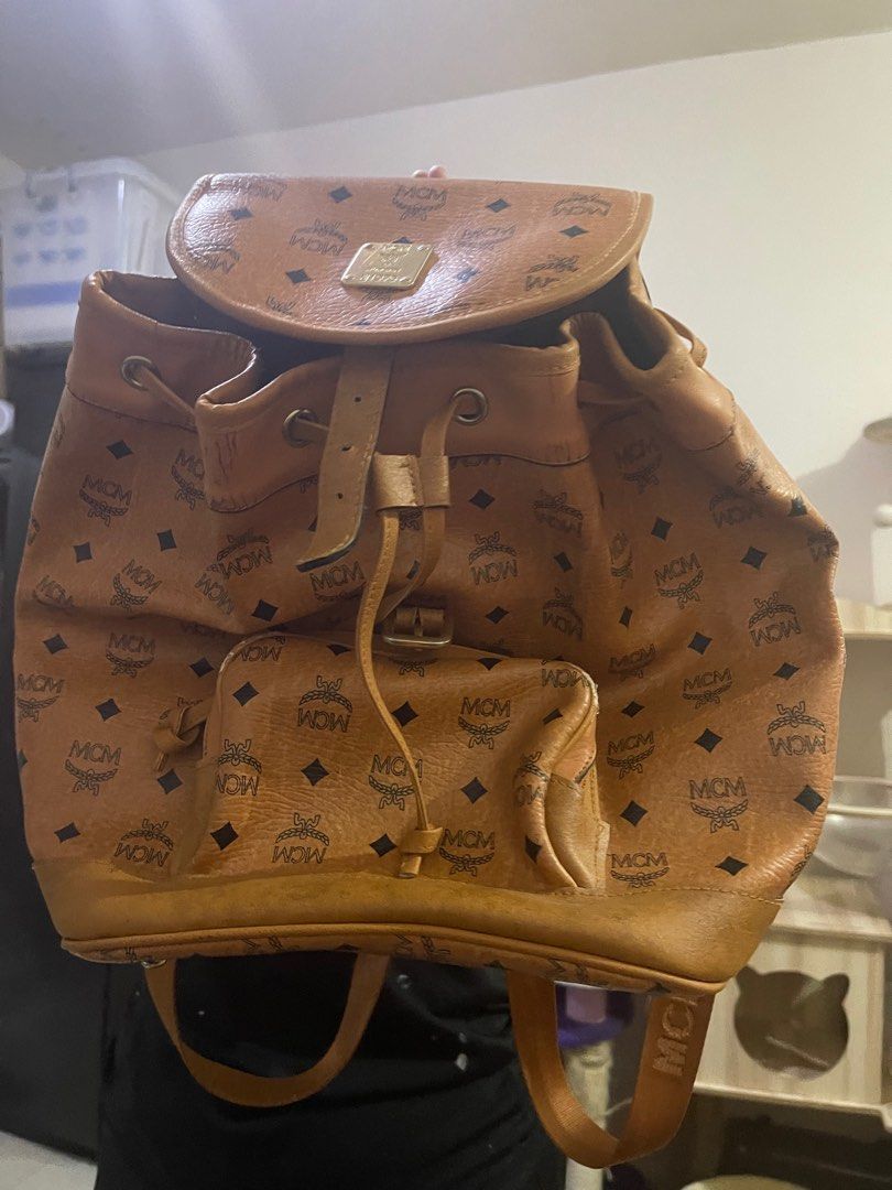 Mcm gold visetos discount drawstring medium cognac