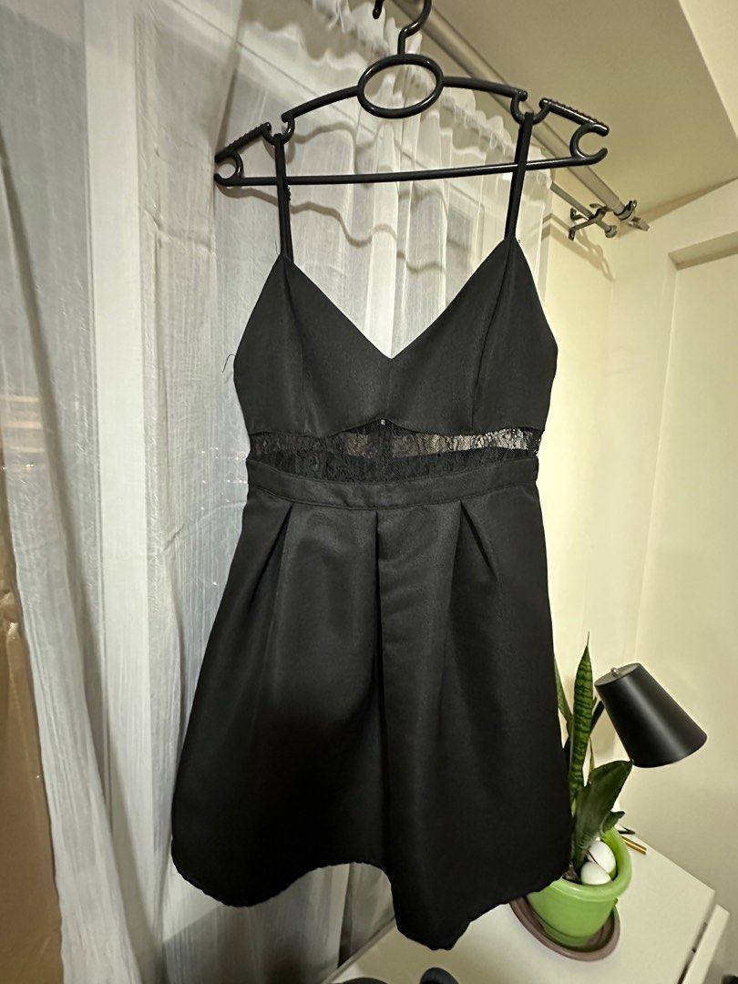 black dress (Category: Dresses) located in Pasig City. Submitted by danda24 (Listing ID 1284468497, Image 1). Description: worn once for an event di na kasya 😅 very flattering when worn pang event po pang small to semi med po measurement laid flat: length 31.5 inches bust 16 waist 14.
