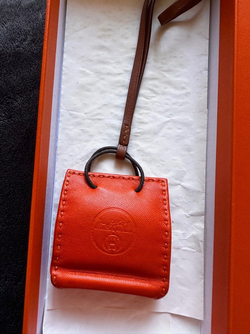 Hermes Paper Bag Charm (Category: Luxury Accessories) located in Santa Rosa. Submitted by traveljewelsnbags (Listing ID 1284541988, Image 3). Description: Complete with Box.