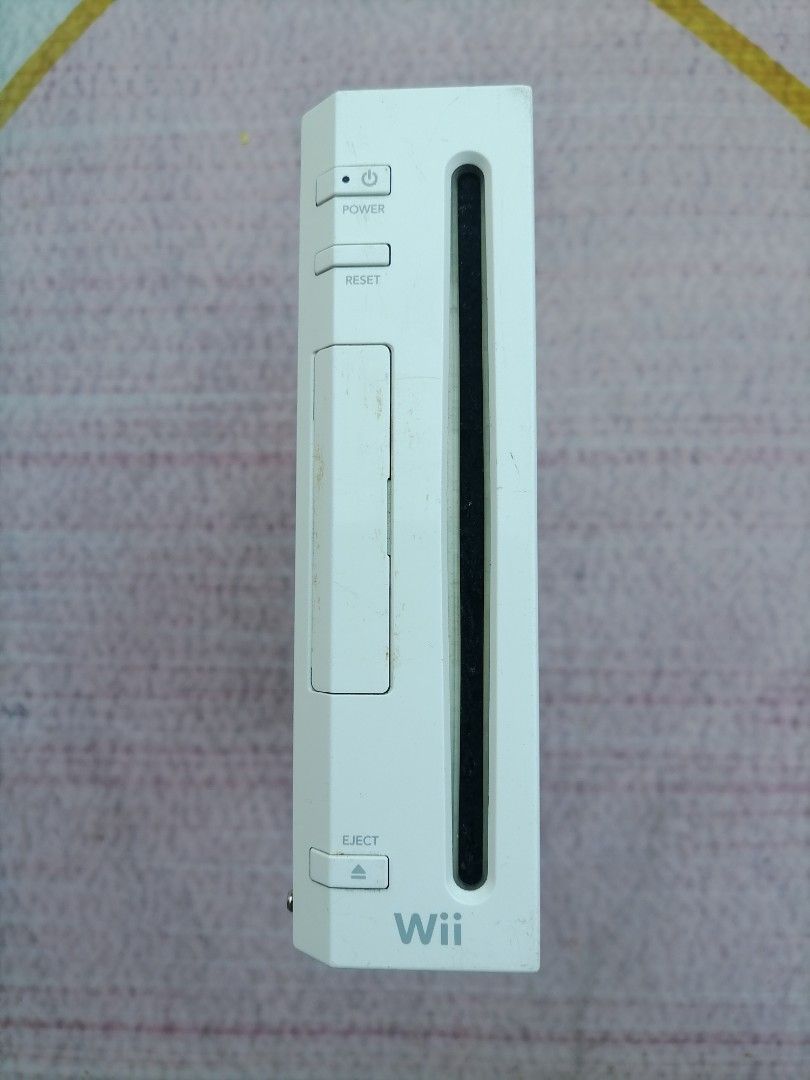 Nintendo wii USA (Category: Nintendo) located in Cainta. Submitted by apolloeleven33 (Listing ID 1284409105, Image 2). Description: Nintendo wii unit only(USA) Sound-OK Video(mejo madilim) (For parts)(wala na mga turnilyo)(consider defective) No controller No power adapter No Av cable Price 300.