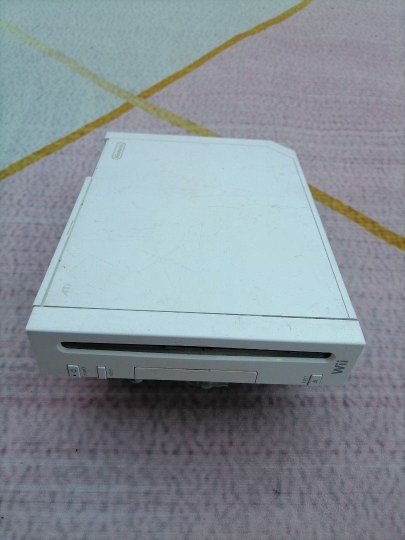 Nintendo wii USA (Category: Nintendo) located in Cainta. Submitted by apolloeleven33 (Listing ID 1284409105, Image 1). Description: Nintendo wii unit only(USA) Sound-OK Video(mejo madilim) (For parts)(wala na mga turnilyo)(consider defective) No controller No power adapter No Av cable Price 300.