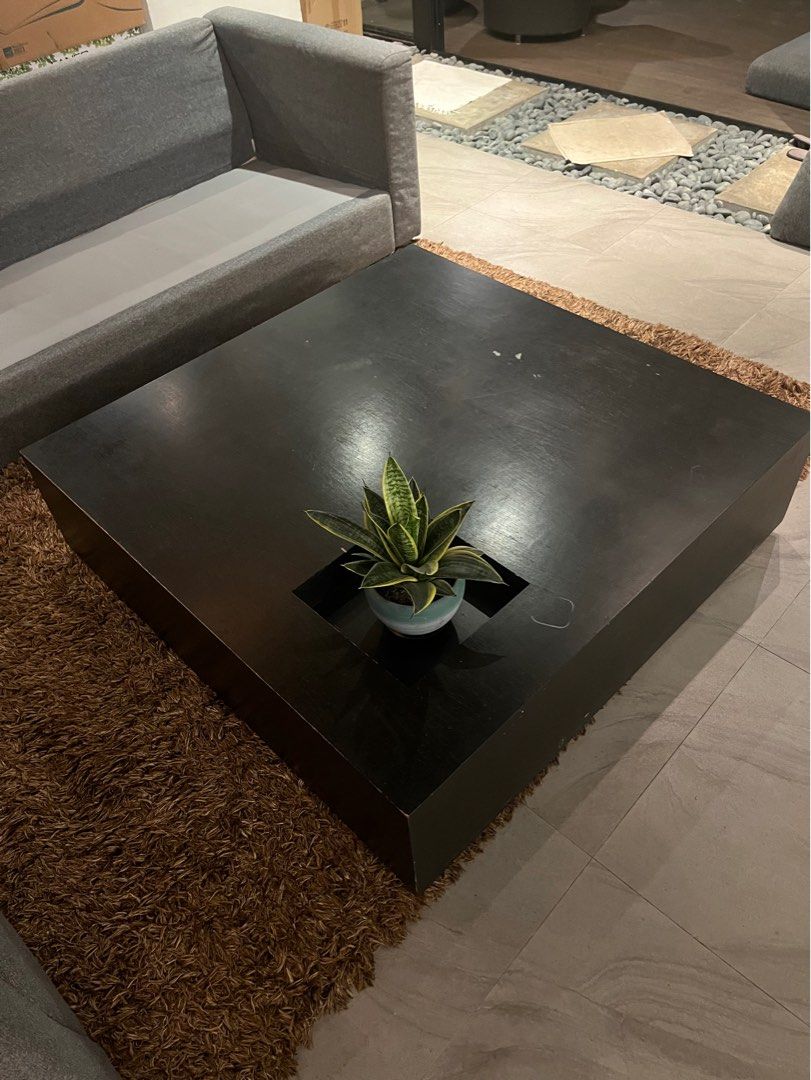 Solid Wood Coffee Table (Category: Tables & Sets) located in Singapore. Submitted by lanadelreystan (Listing ID 1284471129, Image 1). Description: Big & heavy solid wood black coffee table with storage space 120x120cm Please arrange own delivery.