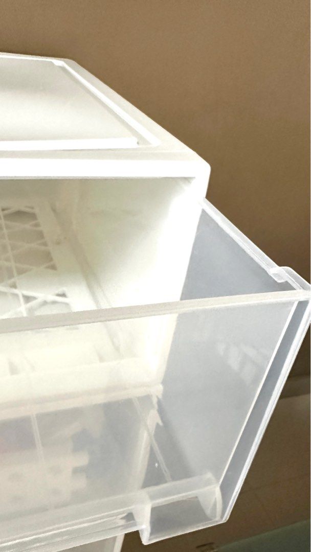 Stackable Plastic Drawer (White) (Category: Shelves, Cabinets & Racks) located in Singapore. Submitted by sithuscott (Listing ID 1284367221, Image 3). Description: Suitable for storing clothes, toys, papers, etc 1 box drawer (good) = $15 1 box drawer (good) = $15 1 box drawer (good) = $15 1 box drawer (small crack) = $10 _____ If you take all Total 4 boxes = $50 Conditions: - All 4 boxes drawer are working, - only 1 box has small plastic crack Se