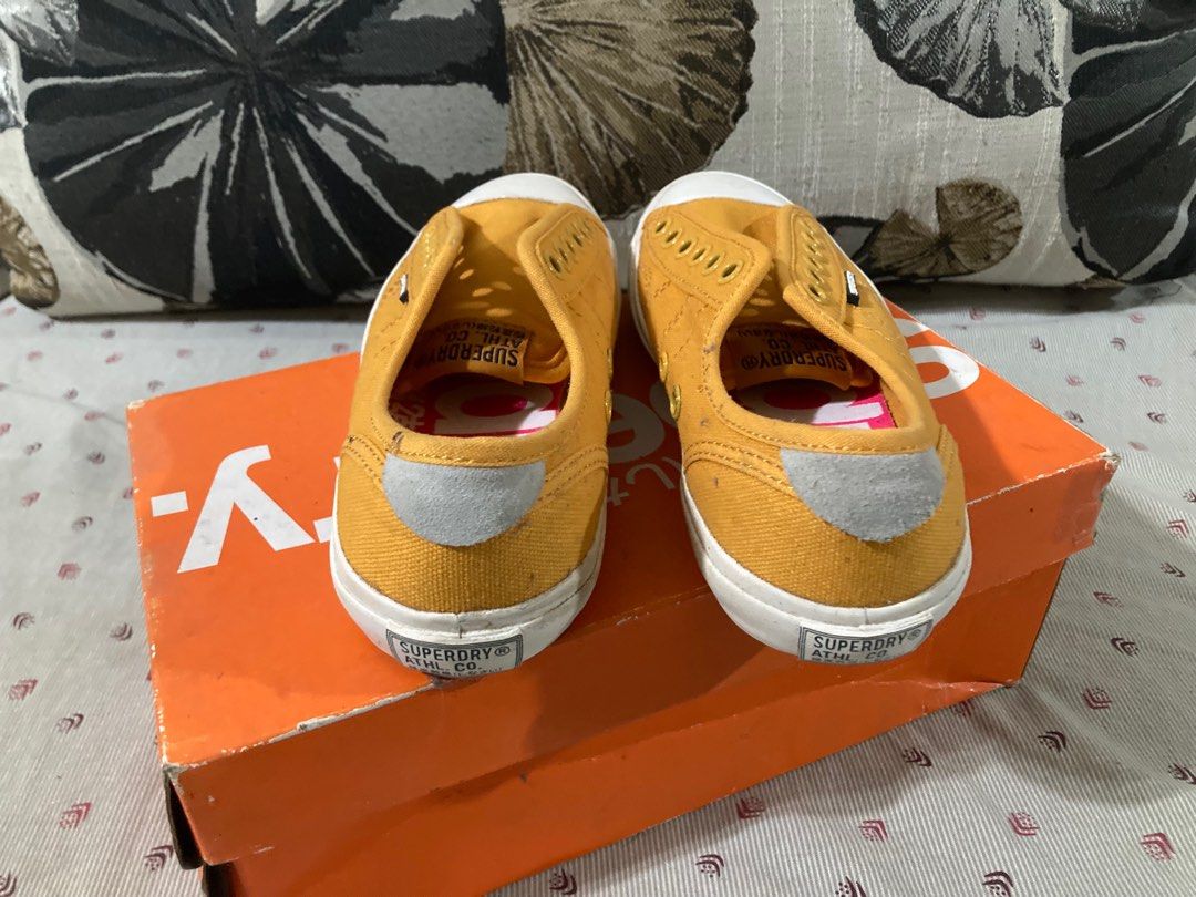 Superdry Low Pro (Category: Sneakers) located in Mandaluyong City. Submitted by sieesel (Listing ID 1284506025, Image 2). Description: Decluttering. US6/UK4/EU 37 Golden Ochre (Womens).