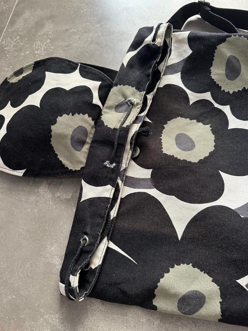 Backpack (Category: Backpacks) located in Singapore. Submitted by safacute (Listing ID 1284708537, Image 3). Description: Marimekko Japan Limited Model Backpack NIPPU UNIKKO BLACK Marimekko Japan Limited Model Backpack NIPPU UNIKKO BLACK Condition 8/10 Slightly torn at the string area, but all is okay not affected much..