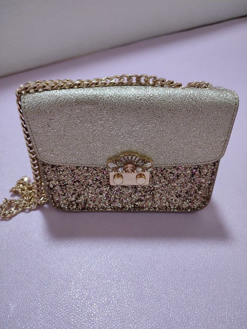 Brand new Charles and Keith embellished buckle crossbody bag. Col