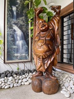 Buddah and nativity wood sculptures