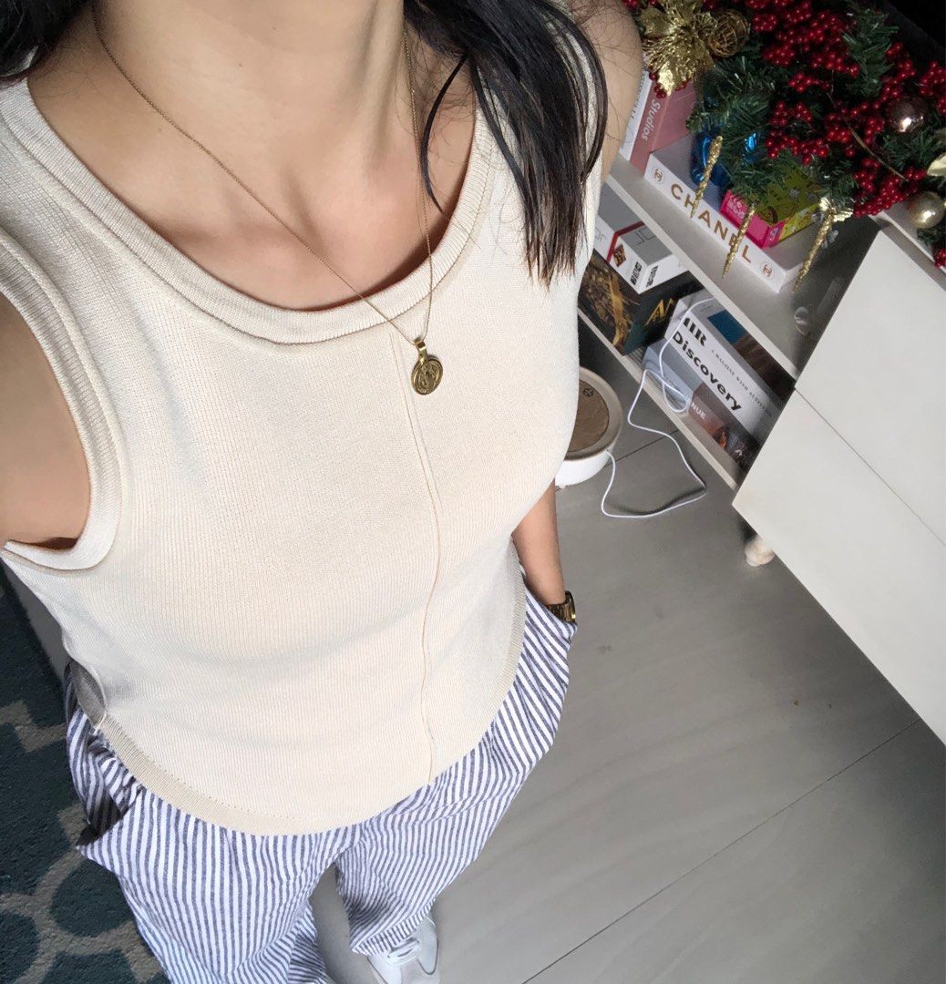 Cream top (Category: Sleeveless) located in Quezon City. Submitted by declutteringgn (Listing ID 1284316878, Image 1). Description: .