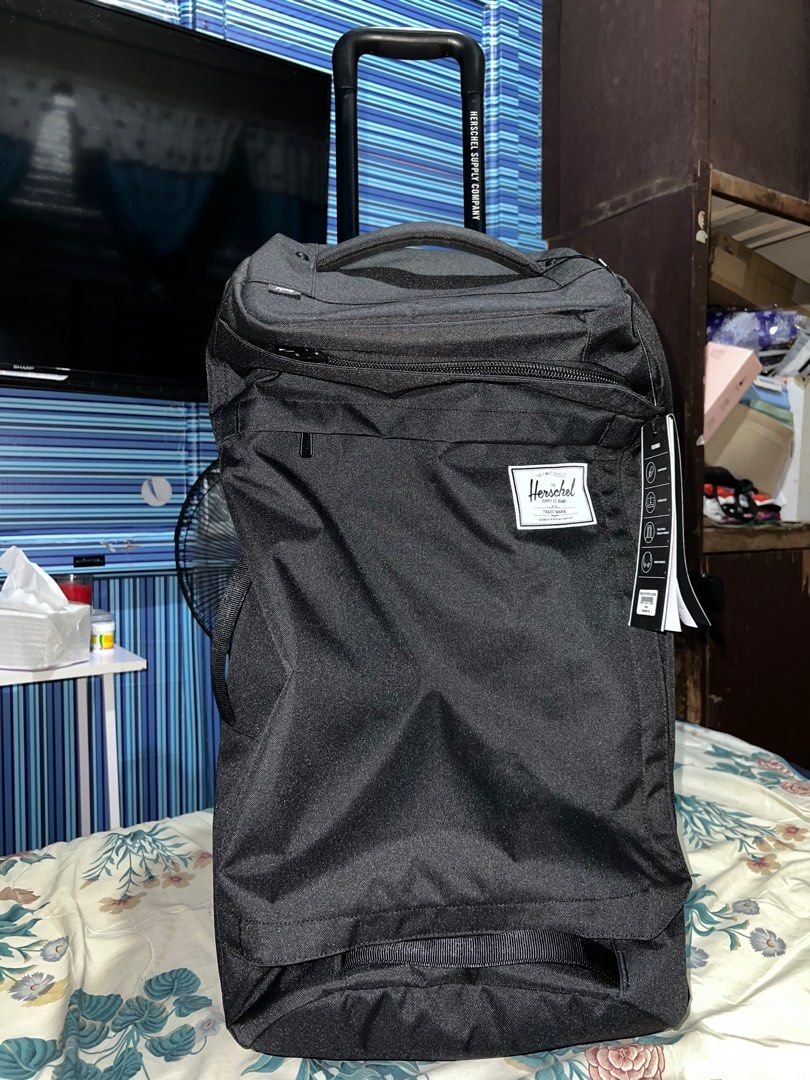 Outfitter wheelie luggage top 90l