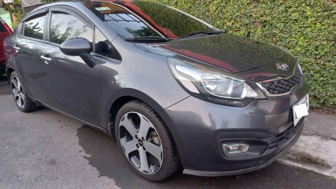 Kia Rio 1.4 4-Dr (M) (Category: Used Cars) located in Quezon City. Submitted by aaronaguila (Listing ID 1284750198, Image 2). Description: Kia Rio 2014, 2015 acquired. 71k Mileage MT 6 Speed 17" Kia Mags, thick tires, 2021. With orig fog lamps Interior looks and smells brand new. Well maintained. In very good running condition. Complete service records..