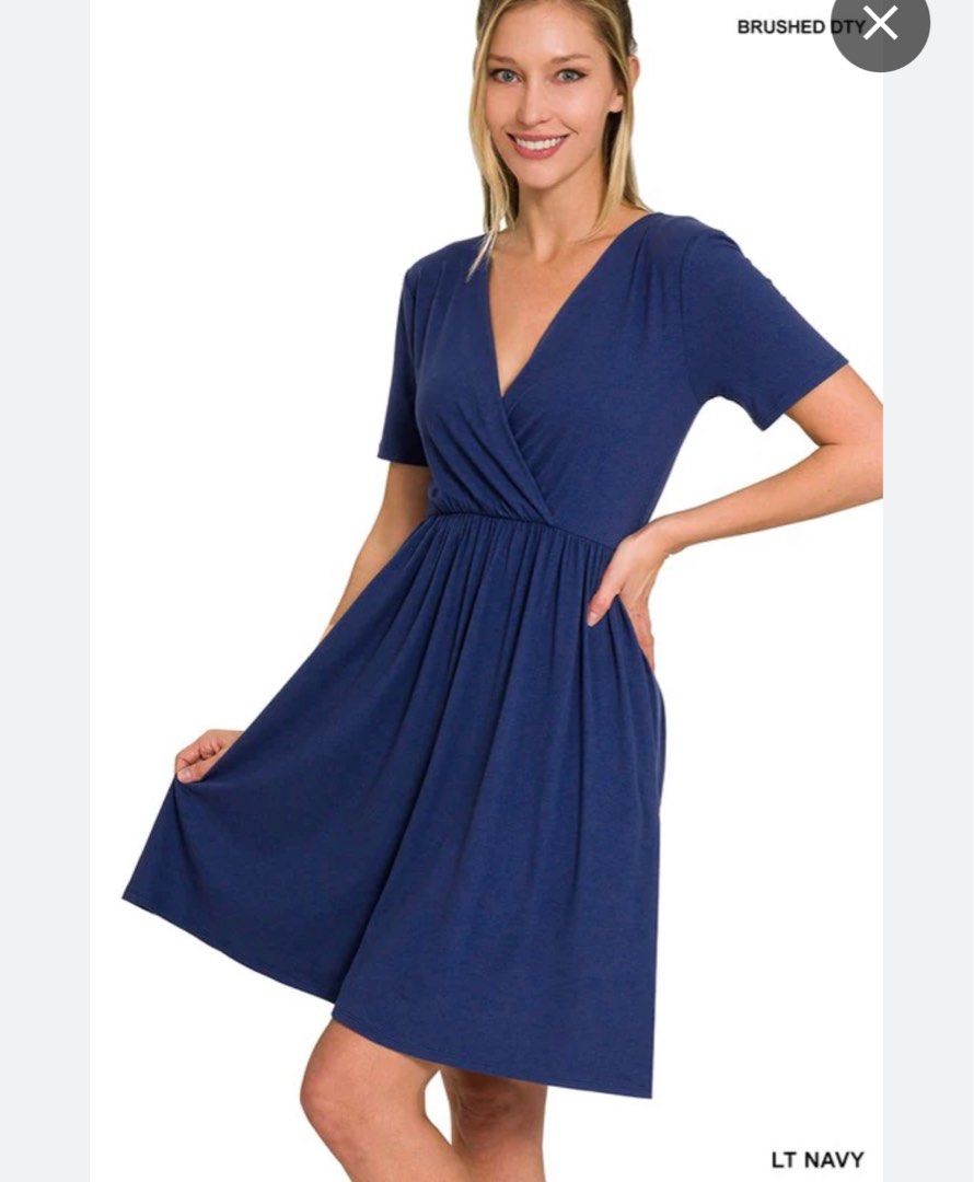Navy Blue Surplice Neck Dress (Category: Dresses) located in Quezon City. Submitted by shopnina (Listing ID 1284664677, Image 1). Description: Navy Blue Surplice Neck Dress •freesize (approx measurements are provided on the last photo) •i’m not sure of the fabric but i think this is crepe, really nice coz ‘di plantsahin haha •brand new, just kept in storage for a long time •no when worn, sorry •RFS: too big on me i also have this in black *photo 