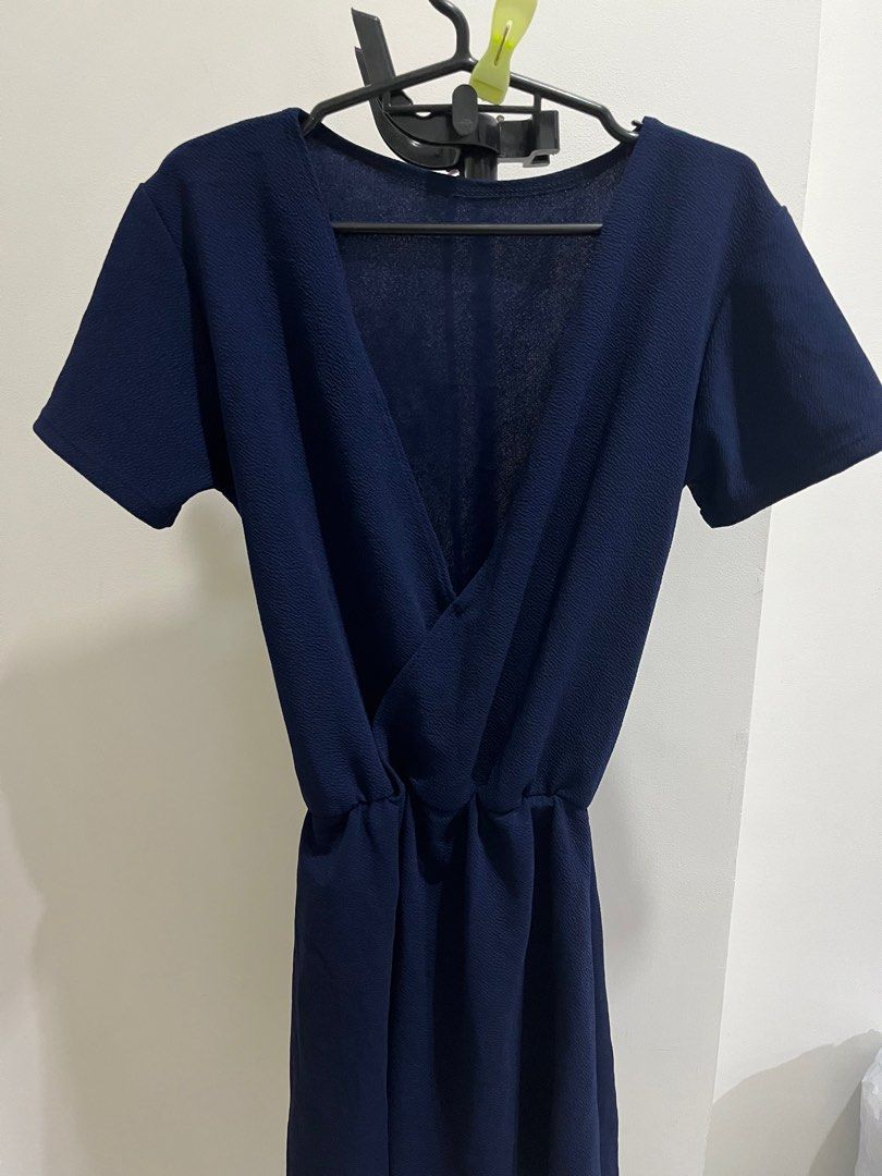 Navy Blue Surplice Neck Dress (Category: Dresses) located in Quezon City. Submitted by shopnina (Listing ID 1284664677, Image 3). Description: Navy Blue Surplice Neck Dress •freesize (approx measurements are provided on the last photo) •i’m not sure of the fabric but i think this is crepe, really nice coz ‘di plantsahin haha •brand new, just kept in storage for a long time •no when worn, sorry •RFS: too big on me i also have this in black *photo 