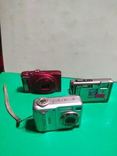 Set of 2 DIGITAL Cameras/Not working/UNTESTED/For parts,as props,display or for restoration. (Olympus---SOLD)