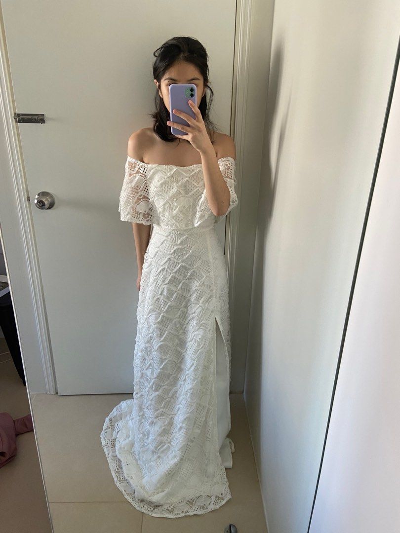 Apartment 8 off shoulder wedding gown (Category: Evening dresses & gowns) located in Mandaluyong City. Submitted by rxysia (Listing ID 1284804199, Image 1). Description: - 5’3 height in photo -never been used, beautiful pattern - small on tag, length goes all the way to the floor - small slit and would make a great simple wedding dress .
