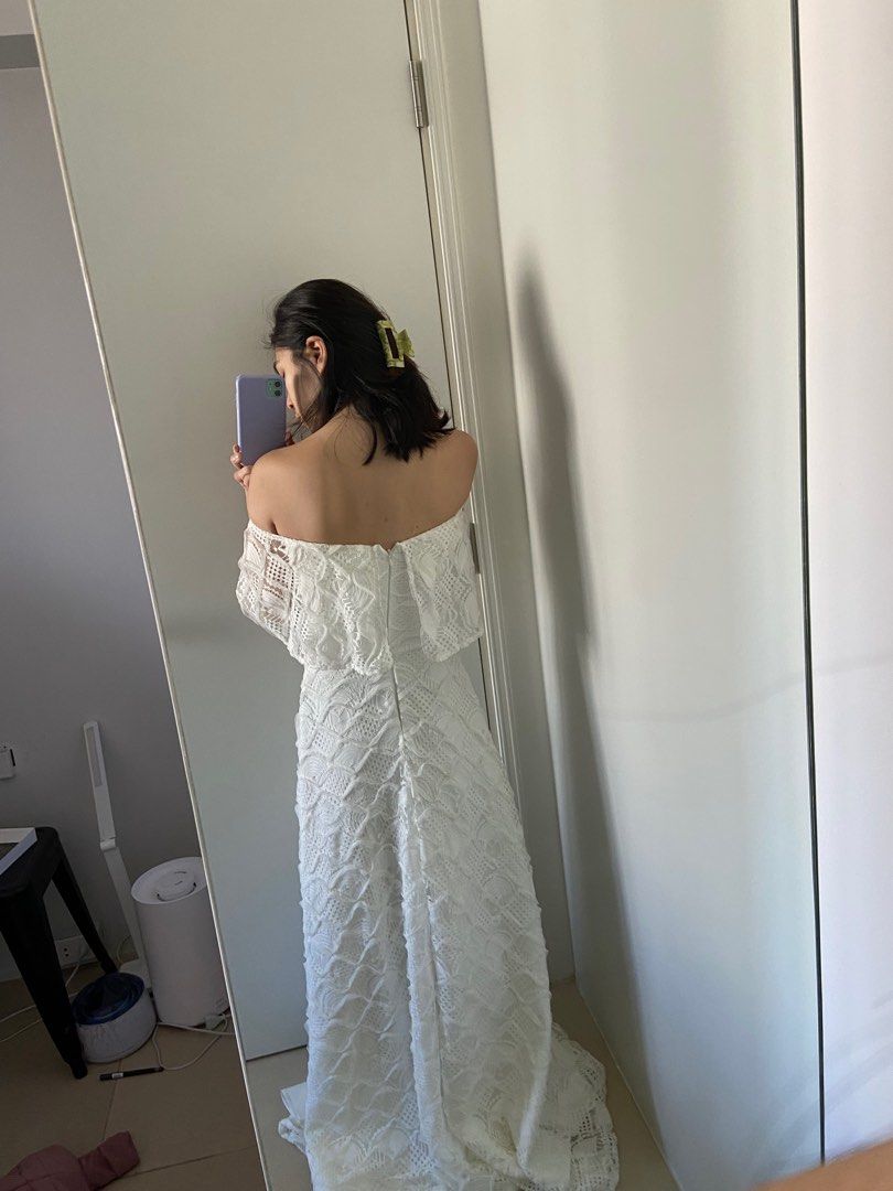 Apartment 8 off shoulder wedding gown (Category: Evening dresses & gowns) located in Mandaluyong City. Submitted by rxysia (Listing ID 1284804199, Image 2). Description: - 5’3 height in photo -never been used, beautiful pattern - small on tag, length goes all the way to the floor - small slit and would make a great simple wedding dress .