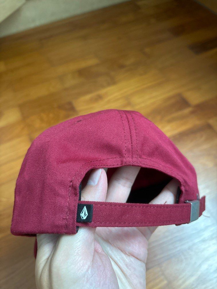 Authentic VOLCOM Hat (Category: Caps & Hats) located in Singapore. Submitted by dylanazx (Listing ID 1284845277, Image 2). Description: Lightly used, in excellent condition Burgundy/maroon colour. Authentic Volcom adjustable hat purchased from Volcom France. Pickup only at west coast crescent. .