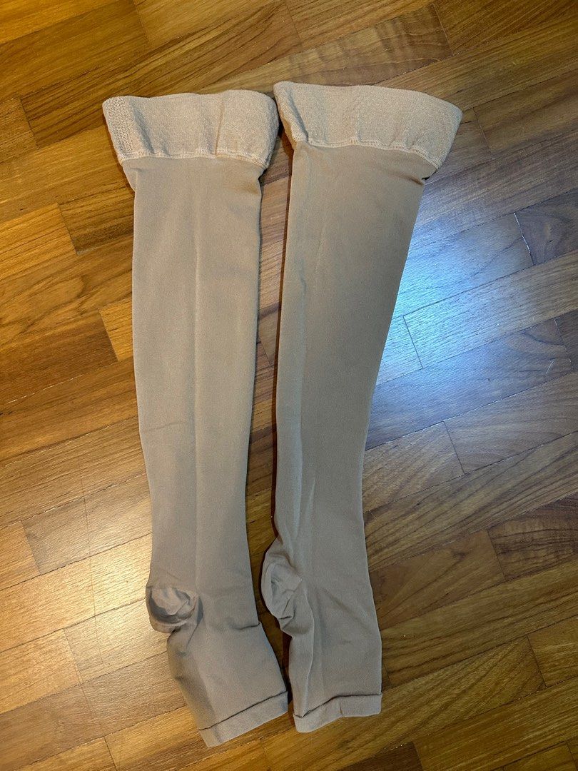 Compression Socks (Category: Socks & Tights) located in Singapore. Submitted by cocoa25 (Listing ID 1284897209, Image 1). Description: Wore once on aeroplane while i was pregnant!.