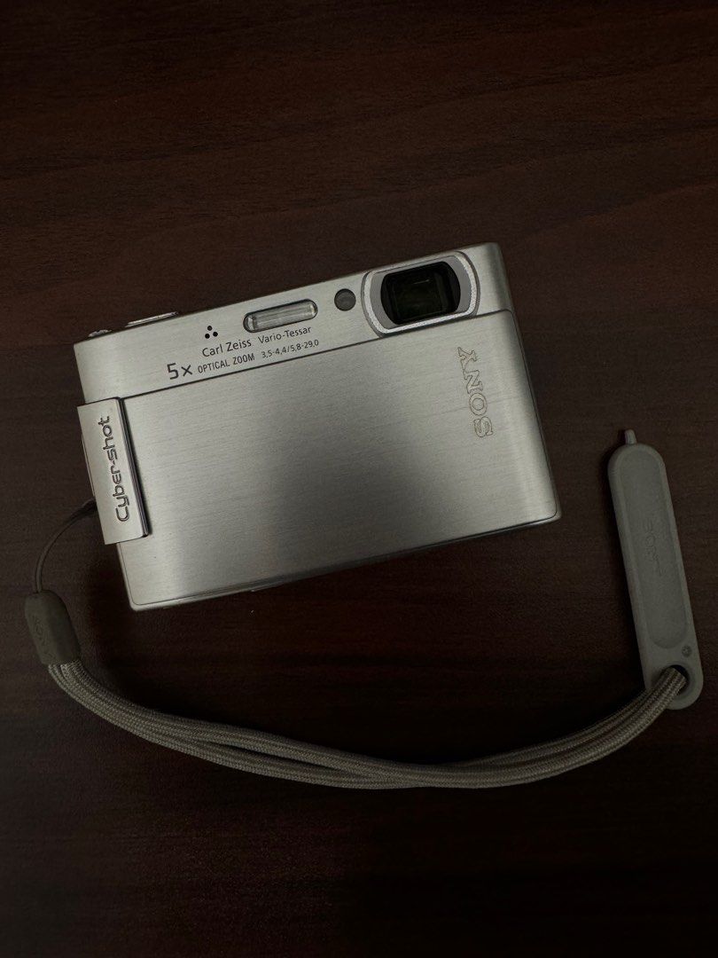 Digital Camera (Category: Cameras) located in Singapore. Submitted by bepobeepboop (Listing ID 1284955883, Image 2). Description: -Sony DSC T-200 -touchscreen -comes with microSD card + adaptor (since camera uses memory duo pro) + battery + charger for battery -SD Card Reader Included (for iphone lightning) -japanese only .