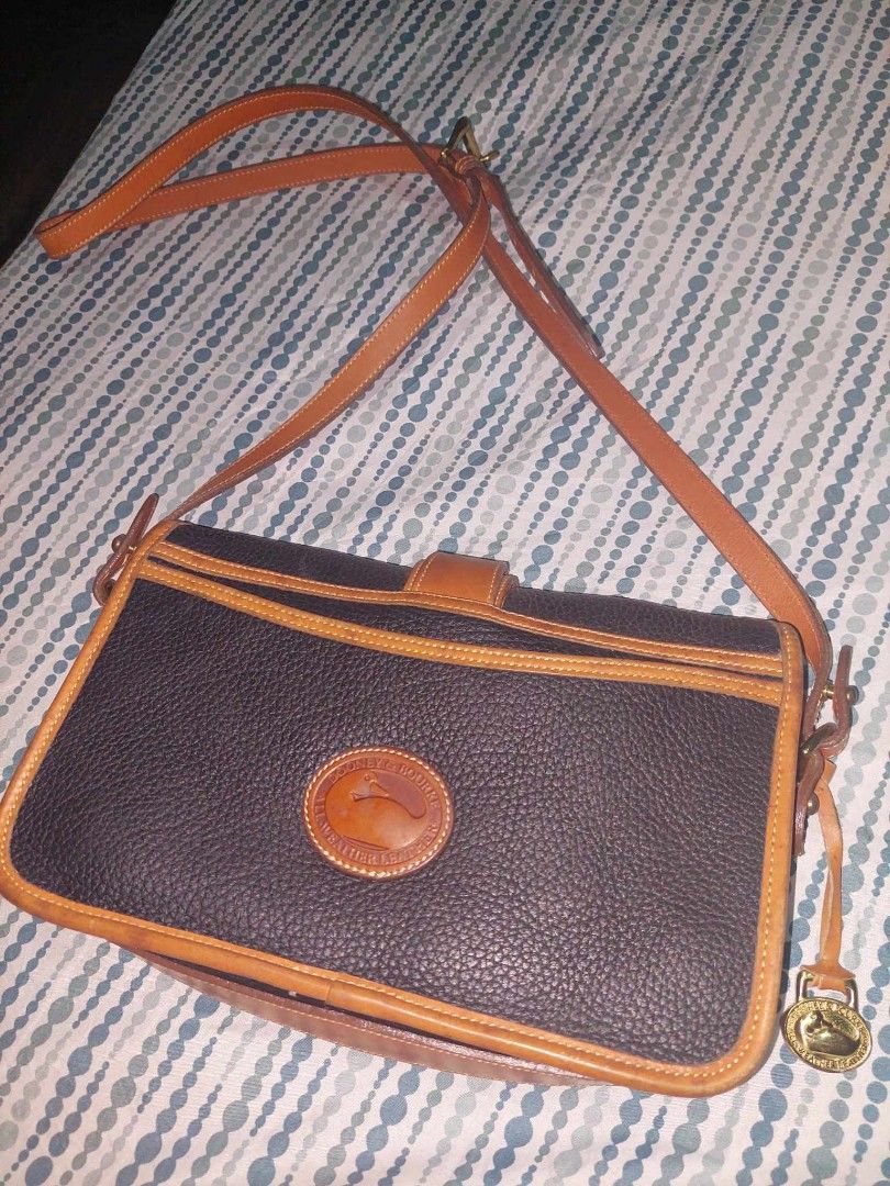 Dooney & Bourke Bag (Category: Cross-body Bags) located in Manila. Submitted by quing13 (Listing ID 1284903746, Image 2). Description: Preloved Dooney & Bourke from the US Negotiable.