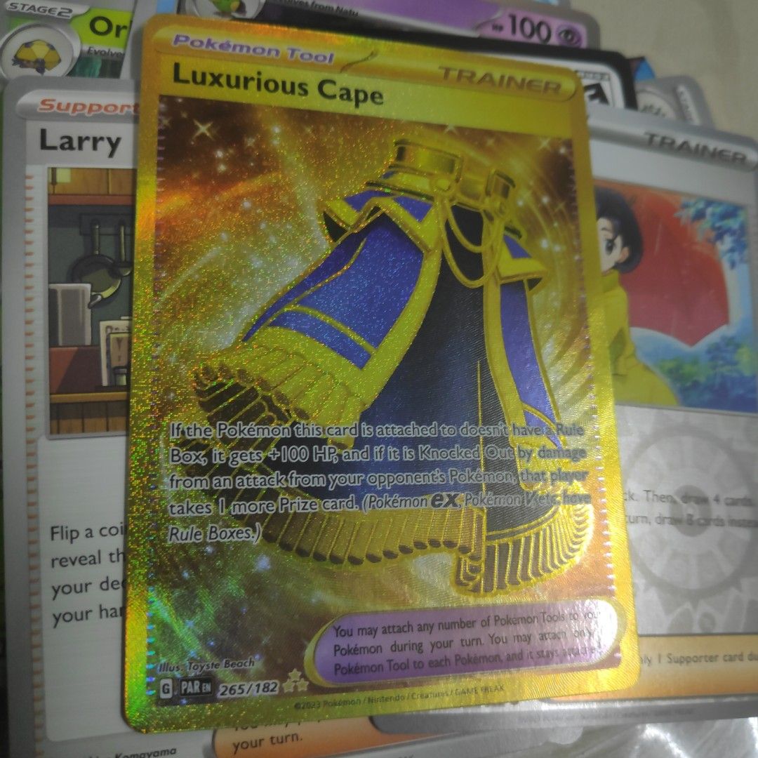 gold luxurious cape pokemon card Pokemon - Luxurious Cape 265/182 - Paradox Rift - Hyper Rare - Gold Foil main image 1