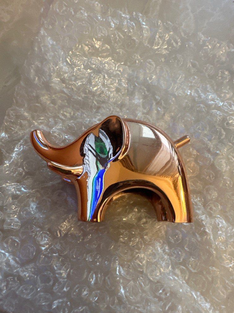 Rose gold elephant ring holder deals