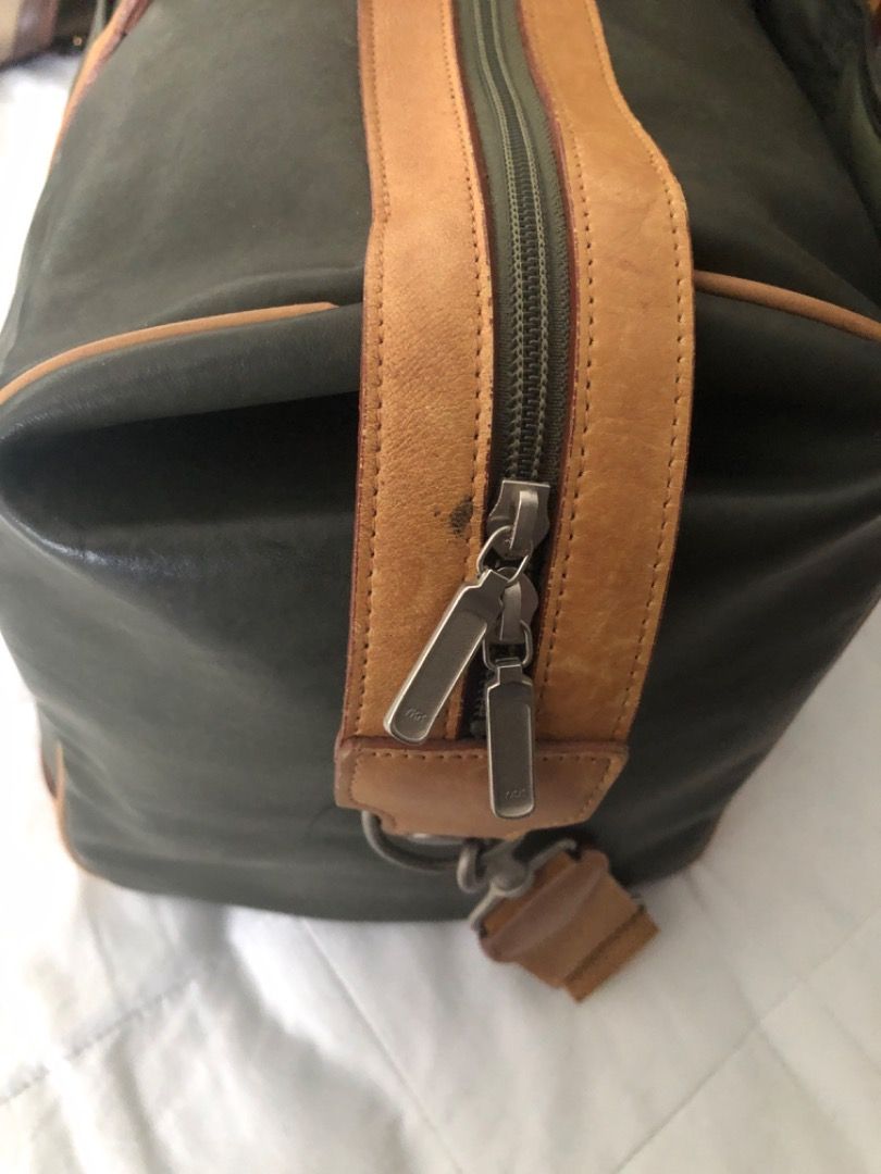 UNGARO travelling duffle bag (Category: Luxury Bags & Wallets) located in Davao. Submitted by mliza1020 (Listing ID 1284831699, Image 3). Description: Ungaro vintage XL leather travelling bag with sling. Dimension: H 28 x L 52 x W 22 cm (approx).