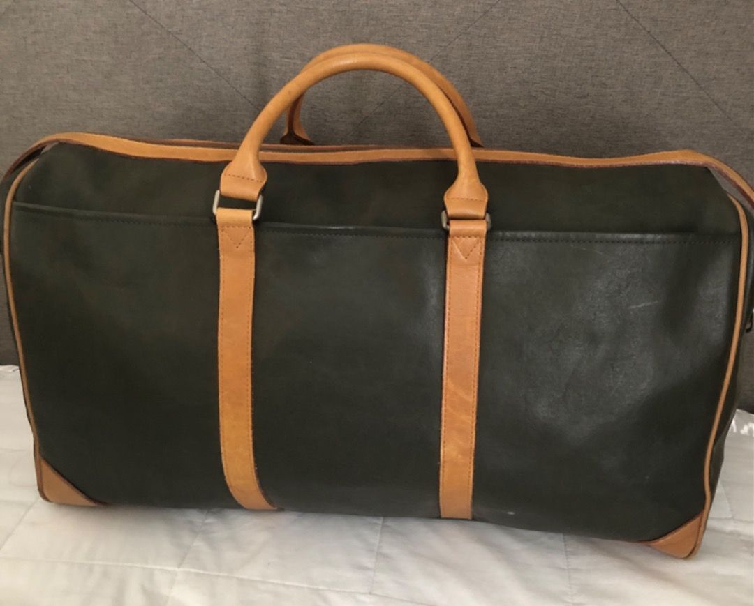 UNGARO travelling duffle bag (Category: Luxury Bags & Wallets) located in Davao. Submitted by mliza1020 (Listing ID 1284831699, Image 2). Description: Ungaro vintage XL leather travelling bag with sling. Dimension: H 28 x L 52 x W 22 cm (approx).