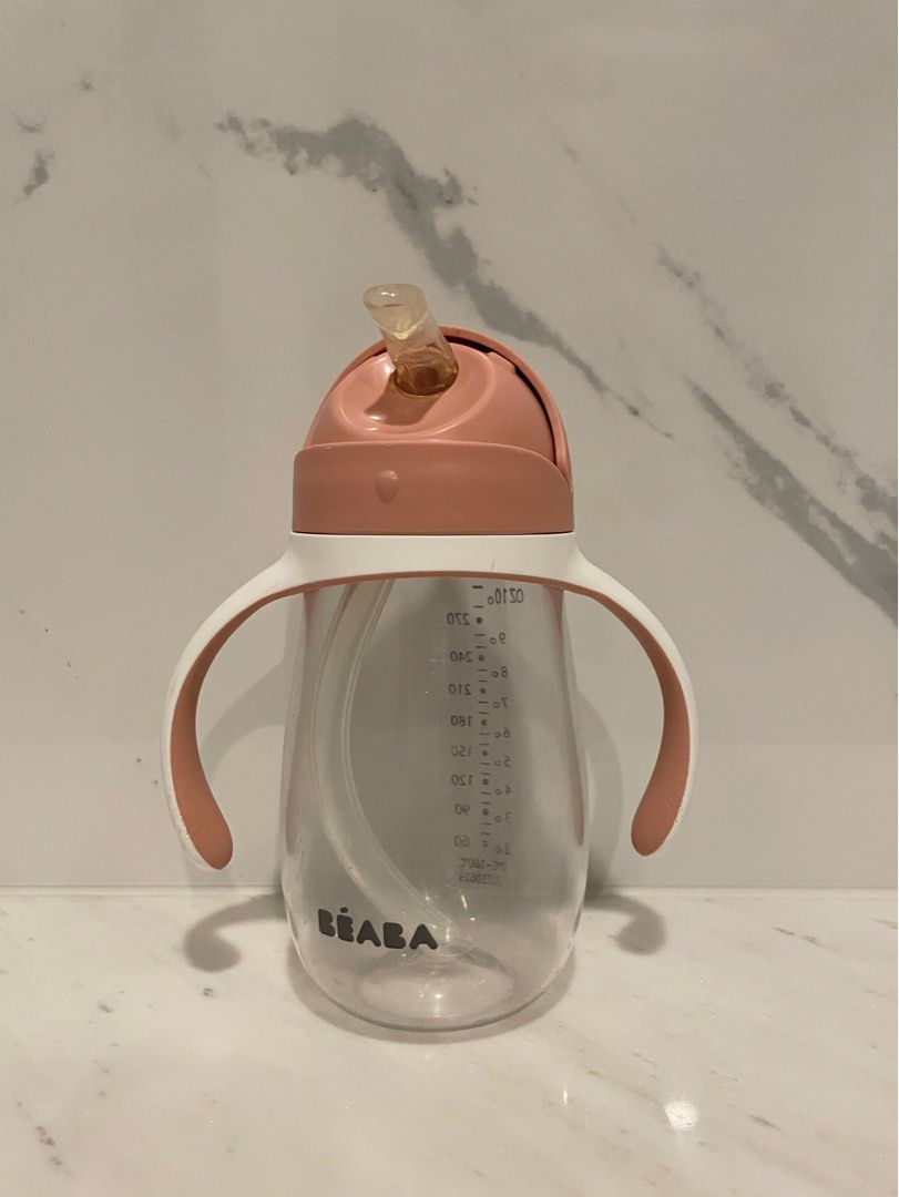 Beaba Straw Cup 300ml Pink (Category: Weaning & Toddler Feeding) located in Quezon City. Submitted by thelazyloft (Listing ID 1285211970, Image 2). Description: Beaba Straw Cup - easy to open - capacity: 300ml - color: Pink - suitable for 8mos + - used, with scratches and dings - with original box.