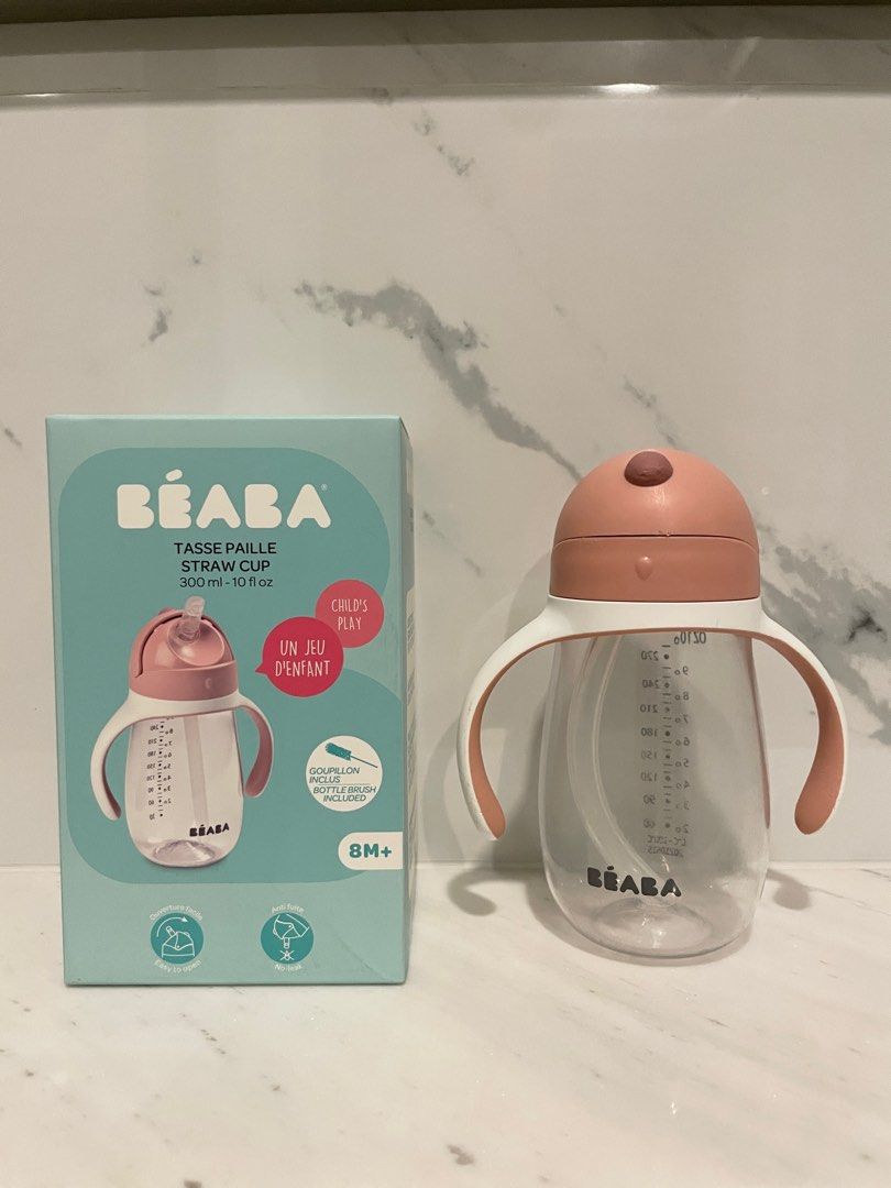 Beaba Straw Cup 300ml Pink (Category: Weaning & Toddler Feeding) located in Quezon City. Submitted by thelazyloft (Listing ID 1285211970, Image 1). Description: Beaba Straw Cup - easy to open - capacity: 300ml - color: Pink - suitable for 8mos + - used, with scratches and dings - with original box.
