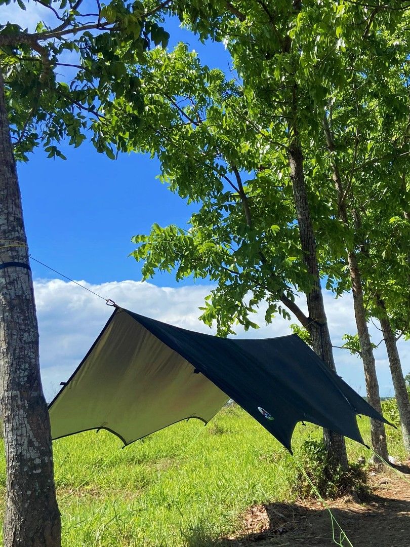 Camping tarp shelter v1 (Category: Hiking & Camping) located in Baliuag. Submitted by abante.outdoor (Listing ID 1285146427, Image 2). Description: Introducing Abante Outdoor Camping Tarp Tent/ Tarp Shelter v1 ₱1️⃣3️⃣5️⃣0️⃣ (TARP ONLY) ✅Size: 12ft x 10ft ✅Waterproof ✅ 16 tie outs ✅Seam sealed top and under ✅1in. Belt lining all sides for strength support.