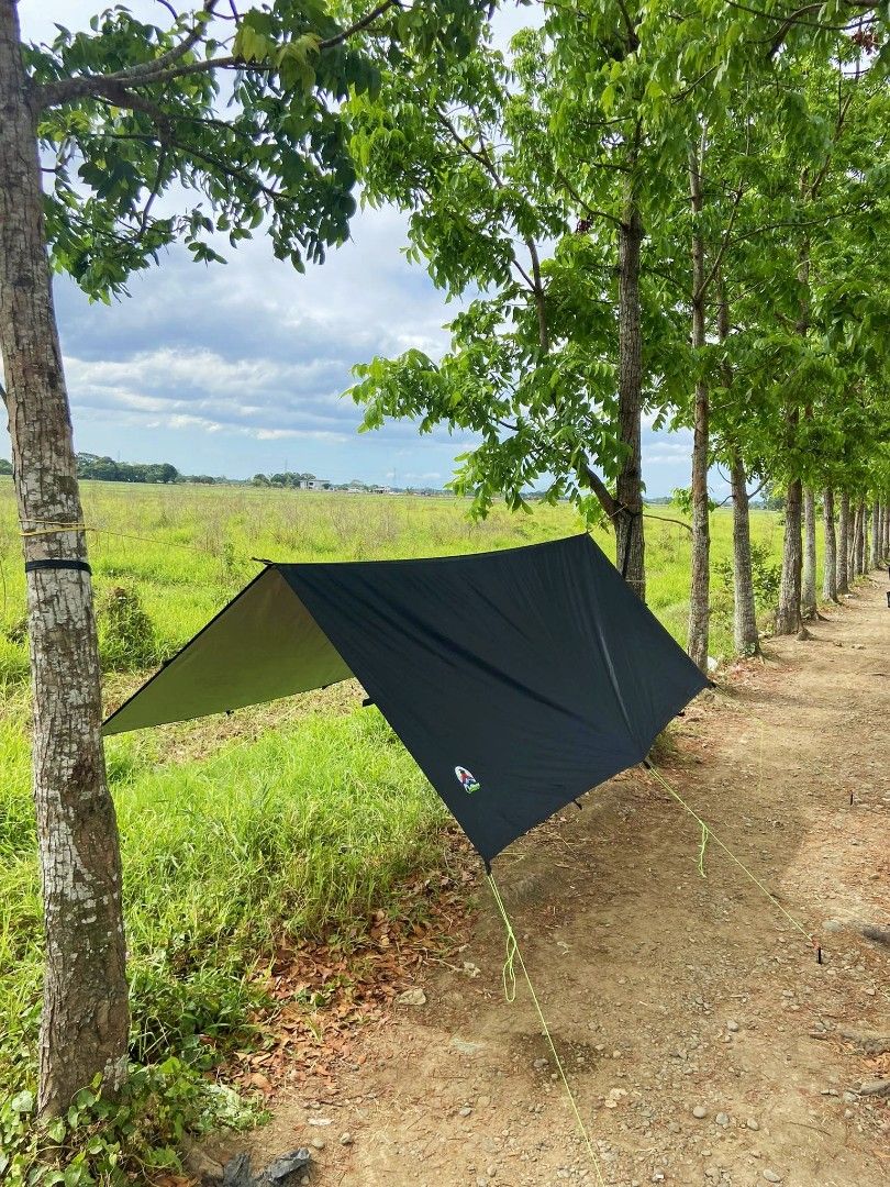 Camping tarp shelter v1 (Category: Hiking & Camping) located in Baliuag. Submitted by abante.outdoor (Listing ID 1285146427, Image 3). Description: Introducing Abante Outdoor Camping Tarp Tent/ Tarp Shelter v1 ₱1️⃣3️⃣5️⃣0️⃣ (TARP ONLY) ✅Size: 12ft x 10ft ✅Waterproof ✅ 16 tie outs ✅Seam sealed top and under ✅1in. Belt lining all sides for strength support.