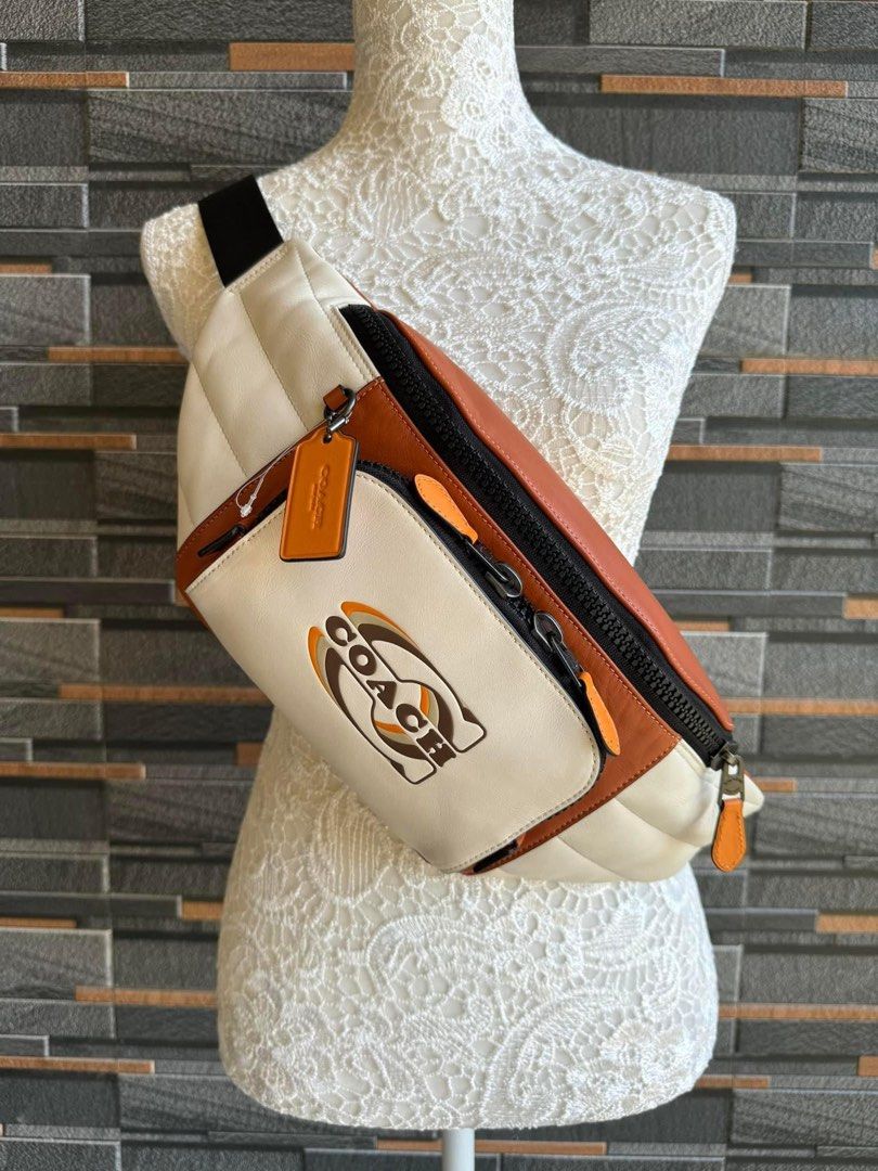 Coach track belt bag (Category: Luxury Bags & Wallets) located in Mandaluyong City. Submitted by stuffnmore (Listing ID 1285162464, Image 1). Description: Track Belt Bag With Quilting And Coach Stamp Inclusion polybag and carecard Guaranteed original and new 7,000 only Product details Measurements Length: 2.75” Height: 16.0” Width: 6.75” Materials Smooth calf leather Fabric lining Strap Adjustable strap with 39” length for wear at waist Features 