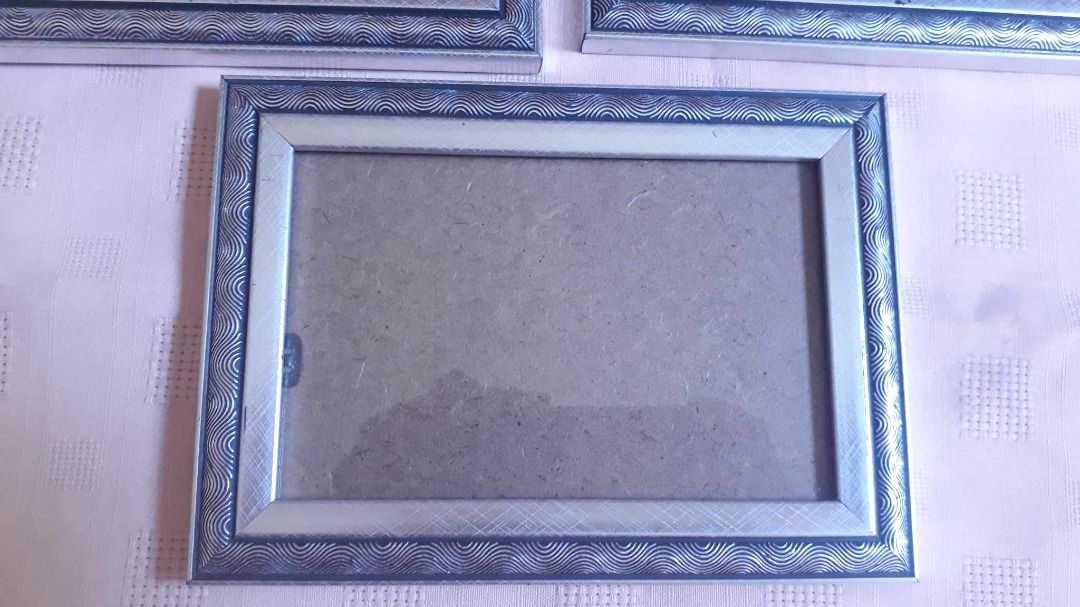 Home Collection Bundle of 3 Silver Toned Lightweight Frames (Category: Frames & Pictures) located in Quezon City. Submitted by jojoleen28 (Listing ID 1285122587, Image 3). Description: Scratches on frames as seen in photos 2 Large frames fits photos 6" x 8" 1 smaller frame fits photo 6" x 4" #Sale2026.