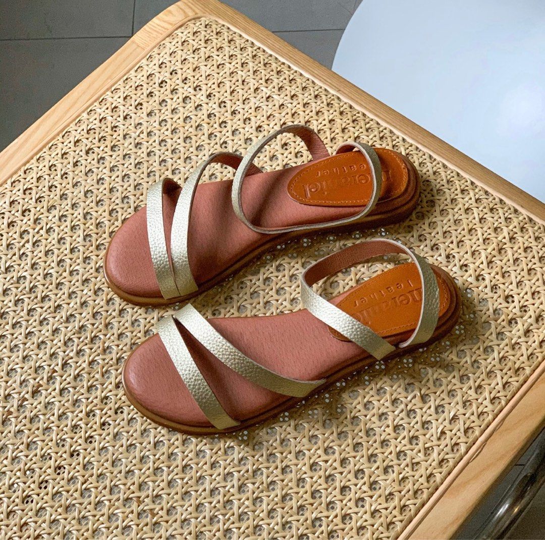 Meraniel Sandals (Category: Flats & Sandals) located in Marikina City. Submitted by lavitaebela (Listing ID 1268826372, Image 1). Description: Meraniel Rue Sandals in Gold - Love these sandals so much cos they’re so pretty and comfy, but they’re a bit big on me :( - Price is negotiable for sure buyers 🤗 - Size: 8 - Color: Gold.