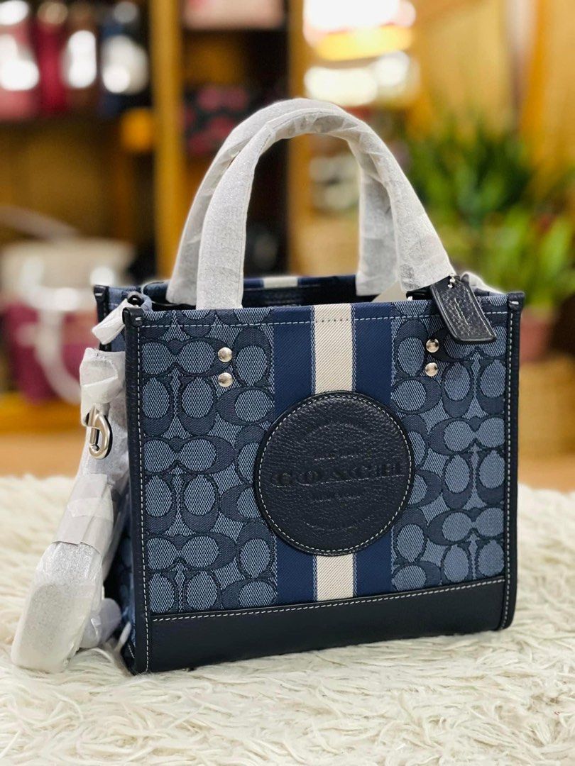 💯ORIGINAL COACH DEMPSEY 22 BLUE DENIM STRIPE (Category: Luxury Bags & Wallets) located in Quezon City. Submitted by ashongsstore (Listing ID 1285128749, Image 1). Description: 🐎C0AÇH COLLECTION 🐎 🇵🇭ONHAND🇵🇭 Dempsey 22 ‼️Please look at our pictures as that is exactly what you are purchasing‼️ 💯GUARANTEED ORIGINAL AND AUTHENTIC or TRIPLE YOUR MONEY BACK! Not REPLICA, OEM, TOP GRADE QUALITY, AUTHENTIC QUALITY or Any other Terms to DENOTE FAK