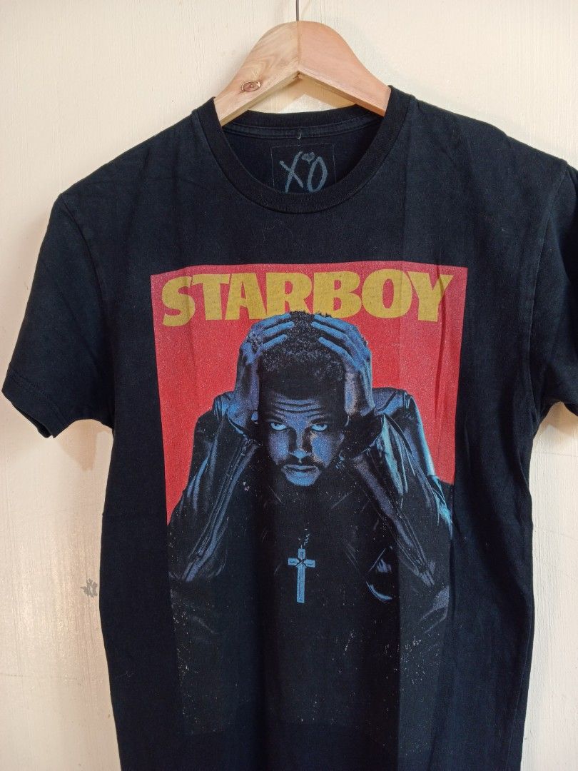 The weeknd starboy shirt (Category: Tshirts & Polo Shirts ) located in Lingayen. Submitted by answ3r (Listing ID 1285124716, Image 2). Description: The Weeknd (STARBOY) (0fficial merch) Width x Length: 17 x 27 Size fit: XS to SMALL Condition: 9/10 good tiny hole near hem, unnoticeable when worn.