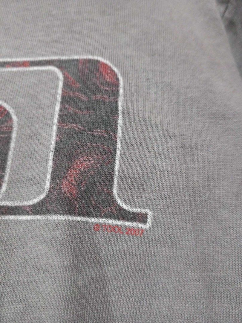 Tool 2007 shirt (Category: Tshirts & Polo Shirts ) located in Iligan City. Submitted by tripeme (Listing ID 1285080098, Image 3). Description: Tool copyright 2007, dimes 21" width x 27" length. With minimal issues, neck fray and 2pinholes..