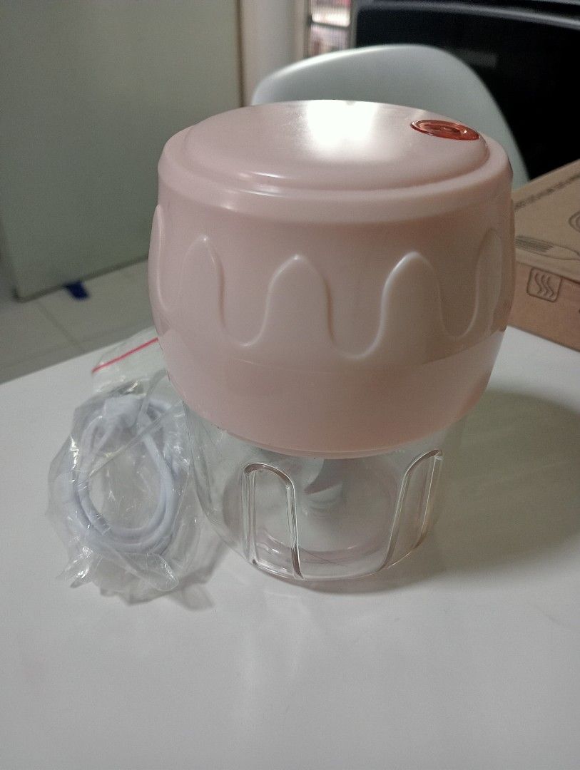 WIRELESS CHOPPER (Category: Juicers, Blenders & Grinders) located in Singapore. Submitted by buddymoverz (Listing ID 1285122829, Image 1). Description: Brand new but doesn't come with box. Charges using USB wire which is also provided. Very handy. Selling because I have this extra brand new set. Can self collect at Woodlands rise.