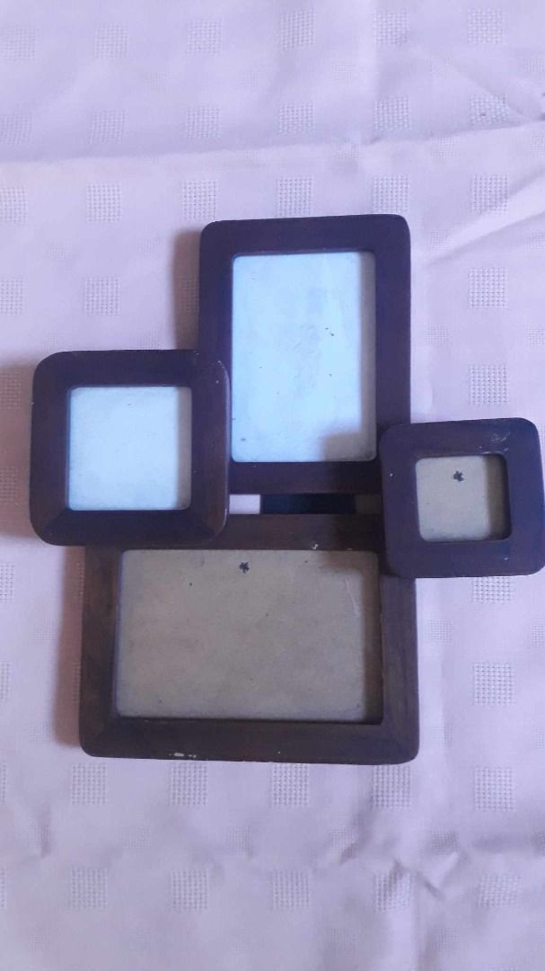 Wooden Frame for 4 Photos (Category: Frames & Pictures) located in Quezon City. Submitted by jojoleen28 (Listing ID 1285109116, Image 1). Description: Made of solid wood. Has scratches on some parts as seen in photos. Unique, great for family photos. Frame size: 10.5" x 11.5" x 1.5" Fits photos for: (1) 2" x 2" (2) 3" x 3" (3) 3.5" x 5" (4) 6" x 4.25" #Sale2026.