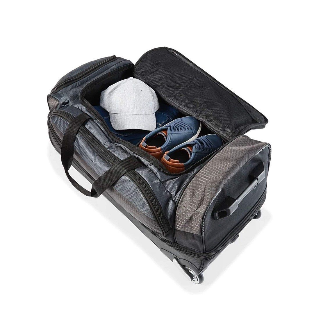 Anko Rolling Transit Duffle Bag, 120L (Category: Luggage) located in Pasay City. Submitted by meostore (Listing ID 1285346291, Image 3). Description: Accessories not included Capacity: 120 litres Dimensions/Size: Bag: 81cm (H) x 38.5cm (W) x 38cm (D) Total height: 84cm (H) Material: Polyethylene (PE), polyester, polyvinyl chloride (PVC), steel and nylon Product weight: 4.5kg Colour: Black Features Double compartment First compartment contains 2 m