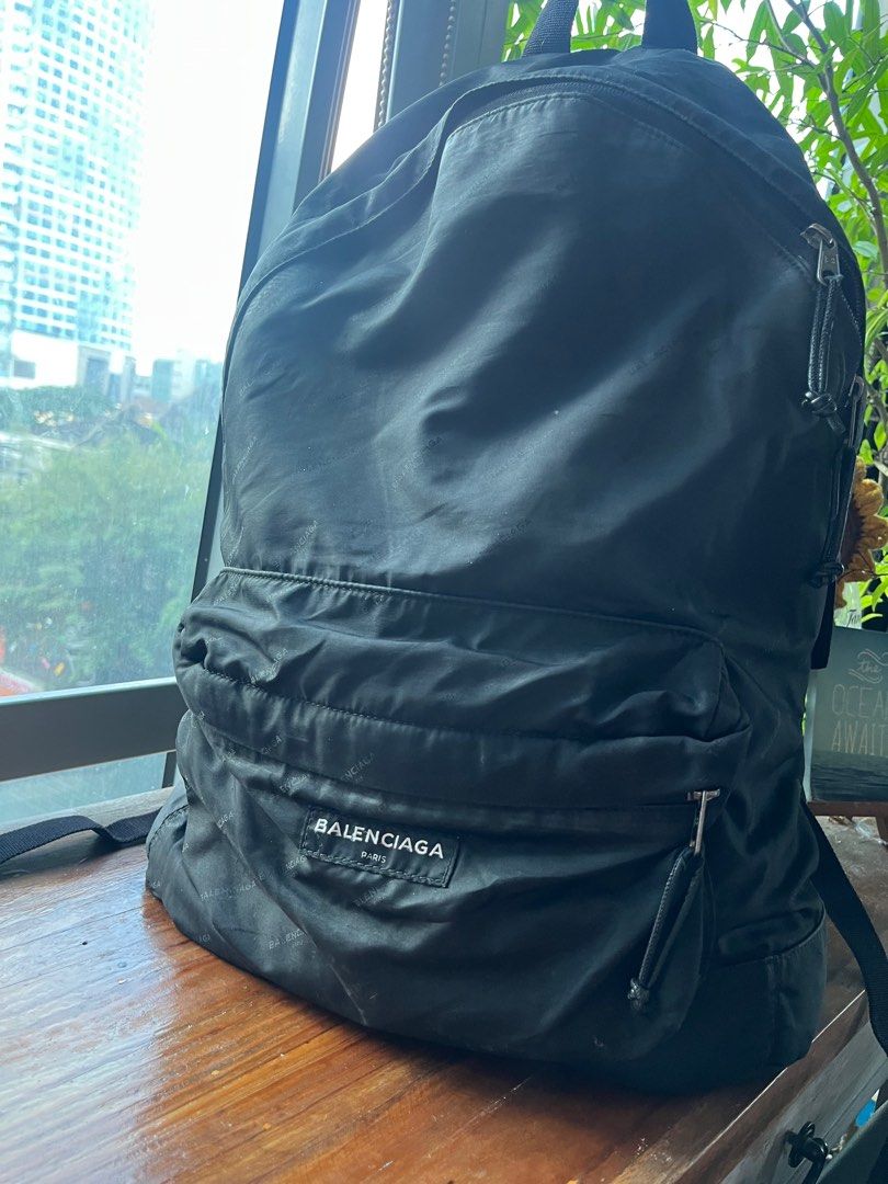 Balenciaga Backpack coded - large , black lightweight (Category: Luxury Bags & Wallets) located in Quezon City. Submitted by vianca13 (Listing ID 1285567469, Image 2). Description: Balenciaga black backpack - large , lightweight *spacious , can fit a lot -with B zip and has code at the back of its tag - has issues on zipper please see last 2 pics for reference thus selling low #officebackpack #cutebackpack #mensbackpack #blackmetrocity #blackback