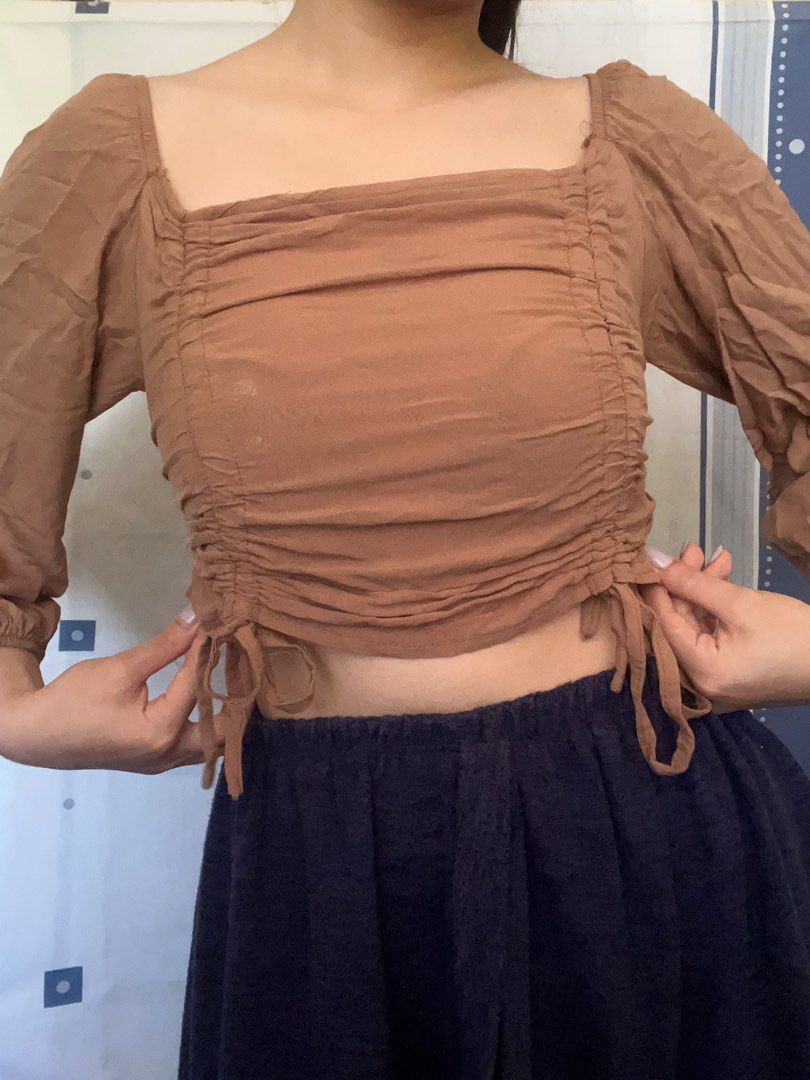 Brown Longsleeves Ruched Top with Smocked Back (Category: Longsleeves) located in Kawit. Submitted by julia_ppp (Listing ID 1285399566, Image 2). Description: fits xs-s, but kaya pa medium fitted lang talaga (im size medium) no issues!.