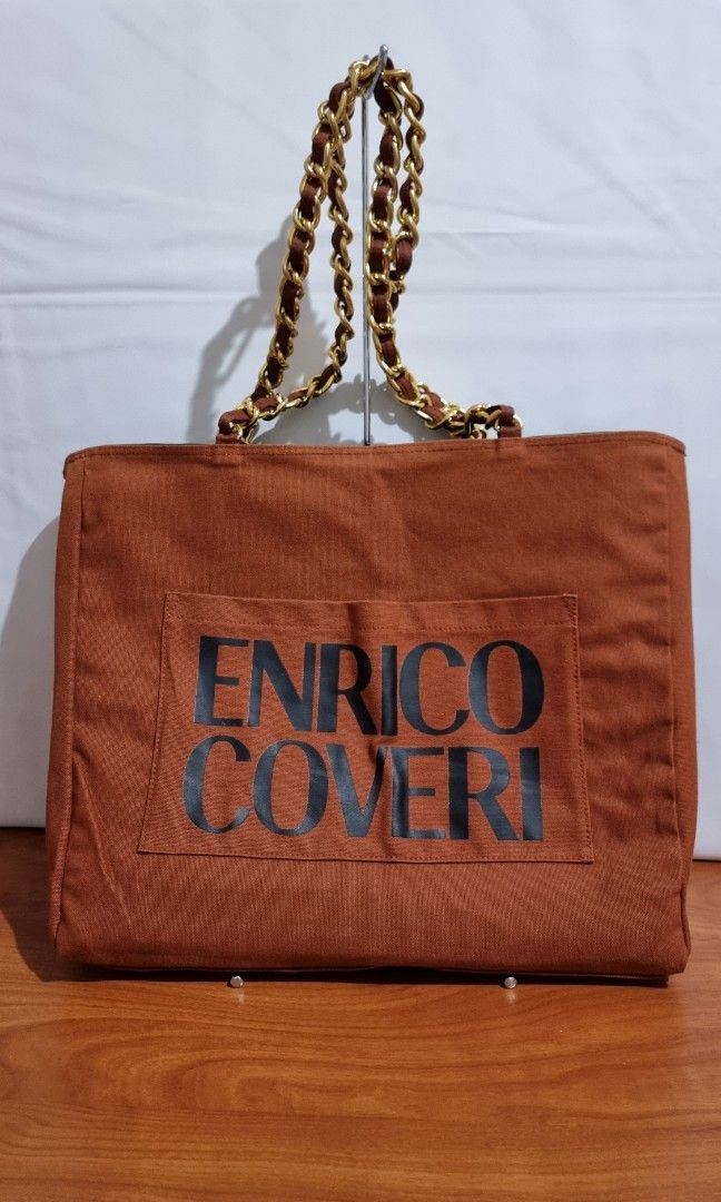 Enrico Coveri Reversible Tote Bag (Category: Tote Bags) located in Binangonan. Submitted by caaaris (Listing ID 1285444436, Image 2). Description: Enrico Coveri Reversible Tote Bag Authentic Dimensions: With very minor signs of use In excellent condition.