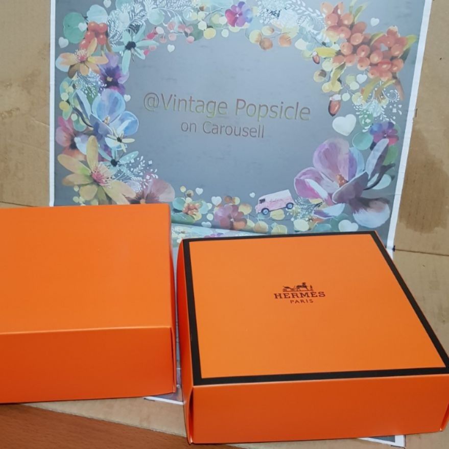 Hermes and Dior Boxes Pls READ (Category: Storage Boxes & Baskets) located in Paranaque City. Submitted by vintagepopsicle (Listing ID 1285396588, Image 3). Description: Hermes and Dior Box for Bags or Wallets Size is 6 x 6 x 2.5 inches NO IDEA if orig or not. It's a box. Put it in your wardrobe and instagram as a background element for your flex, no one will know. Sold as a SET. Sold as it is. Examine actual photos here pls. Gcash and Lalamove.